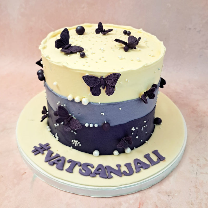 Imagine the moment when your wife sets her eyes on this enchanting butterfly theme cake. The top layer of this 3 layer cake with butterflies, dressed in pure white, represents purity and innocence. It symbolises the unwavering love and devotion you have for her. 