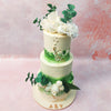 The intricate painting on this Three Tier Bouquet Cake creates a captivating canopy of leaves or a verdant bed of grass.