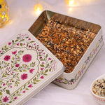 Diwali gift tin filled with trail mix Florentine slabs