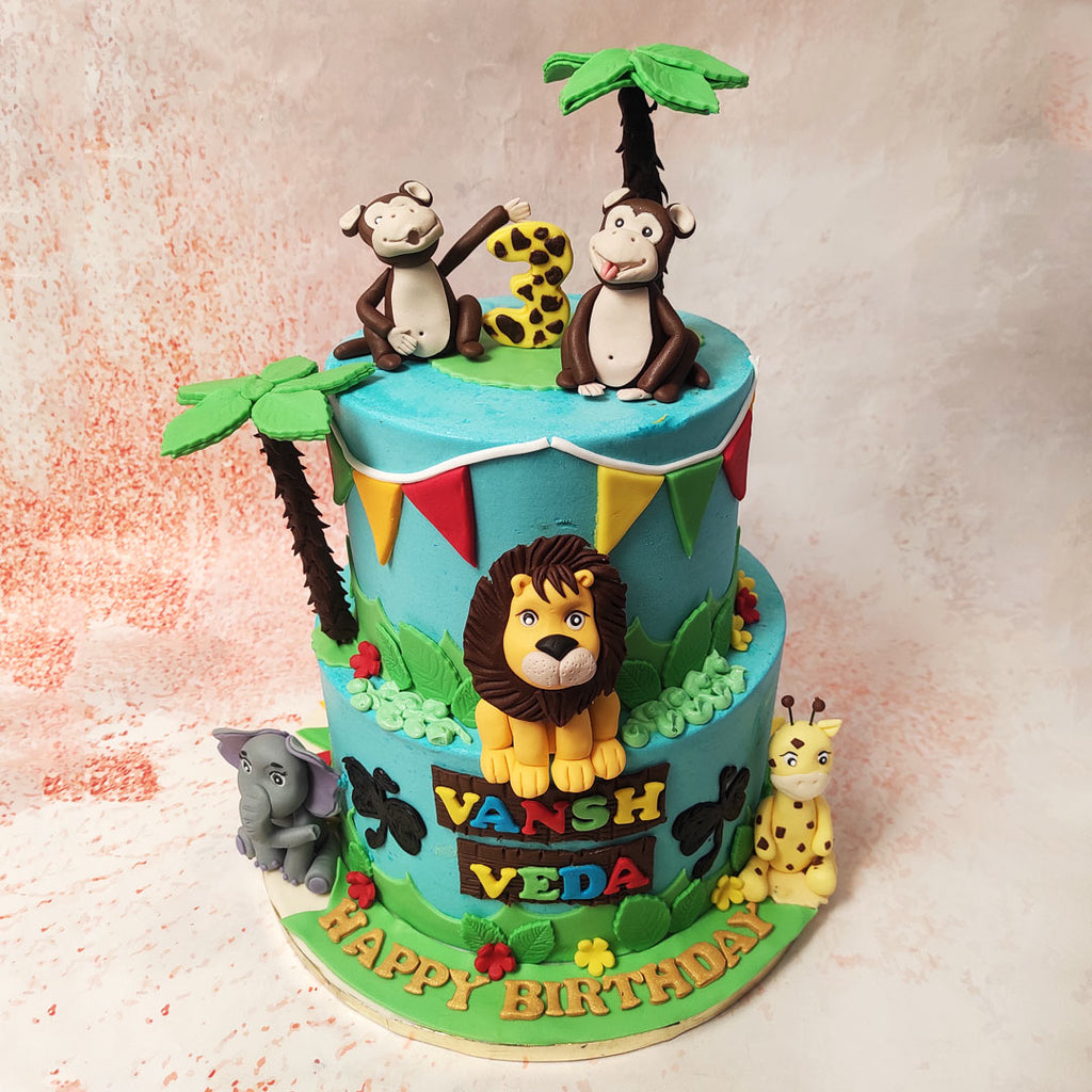 The lion, with its proud mane and regal stance, takes centre stage, symbolising strength, courage, and the king of the jungle, making this Animal Carnival Theme Cake a true showstopper.