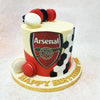 Adorning the top of this Football Theme Cake are vibrant red, white, and navy blue macarons, adding a pop of colour and a delightful touch of sweetness. 