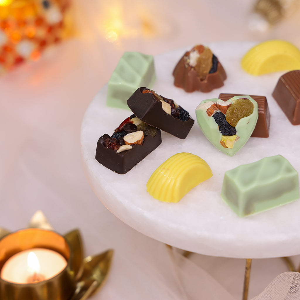 Assorted Diwali chocolates with nuts, caramel, and pistachio fillings