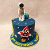This astronaut themed cake design is the definition of "out of this World". With a galaxy theme, a rocket, an astronaut, the moon and the stars, what more could you want from a space theme cake.