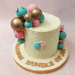 This he or she cake features a creamy base with one pink and one blue 3D foot at the centre. 