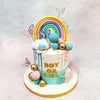 Purple and gold butterflies with lavender-tinted wings flutter gracefully around the Rainbow Drip Baby Shower Cake.