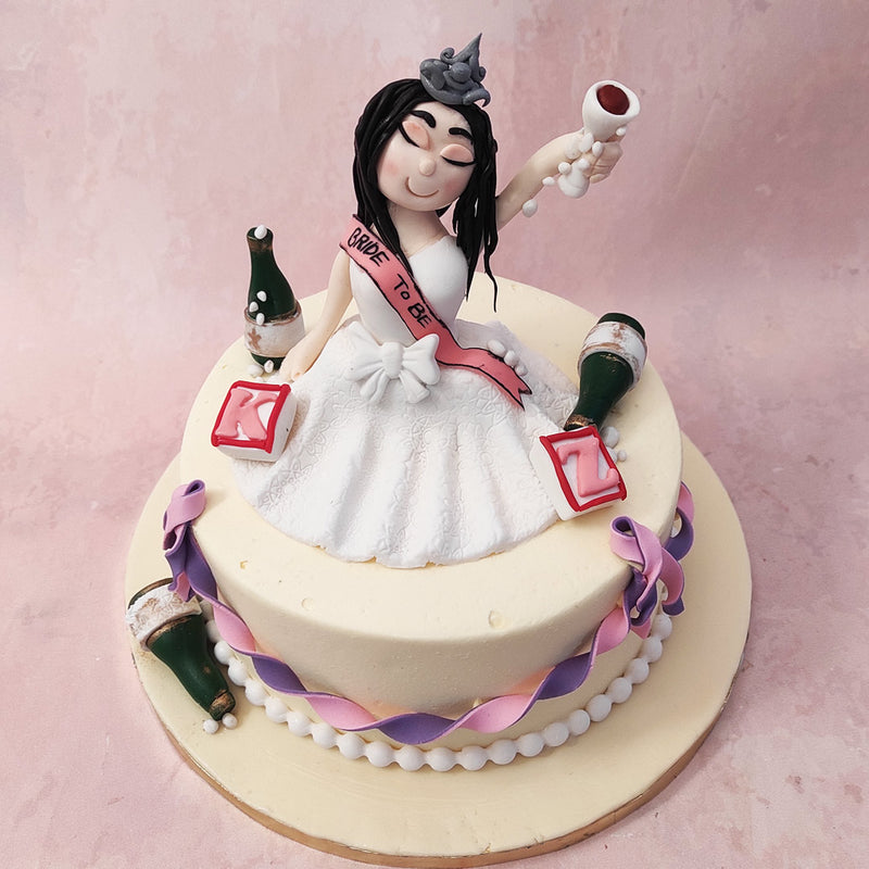 Creating the imagery of a wild night of drinking and partying, classic to any bachelorette party, this bachelor party cake for bride to be has an aesthetic that's grand and flamboyant, reminding the bride of friendship, frollicking and her youth!