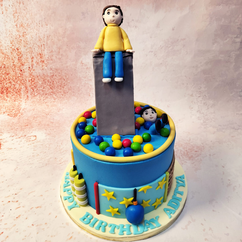 Picture this: a towering confection resembling a vibrant ball pit, complete with edible balls as the base of this Ball Pit Cake. 