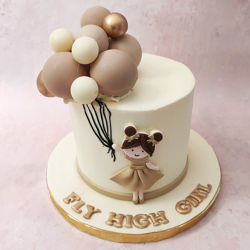 Atop the gentle slopes of this balloons theme cake stood a petite figure, a girl with locks as dark as the twilight, donned in a dress the colour of rich chestnut trees. 
