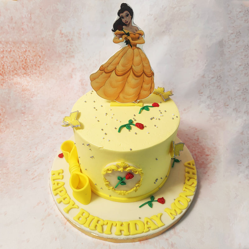 At the heart of this enchanting Beauty and The Beast Cake lies the iconic framed red rose, while a delicate ribbon and bow embrace the base, while graceful 3D edible butterflies alight upon its surface. 