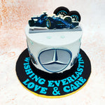 The Benz Car Cake's base proudly displays the iconic Mercedes Benz logo, a symbol of luxury and precision engineering. 