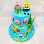 From the handcrafted jellyfish floating across the sides to the mini sea creatures and coral reef accents, every inch of this Bikini Bottom Cake is packed with joyful energy.
