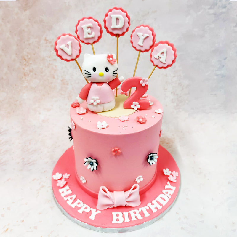 A large pink bow sits gracefully at the bottom of this Birthday Cake For Girls, tying the design together with elegance and style.