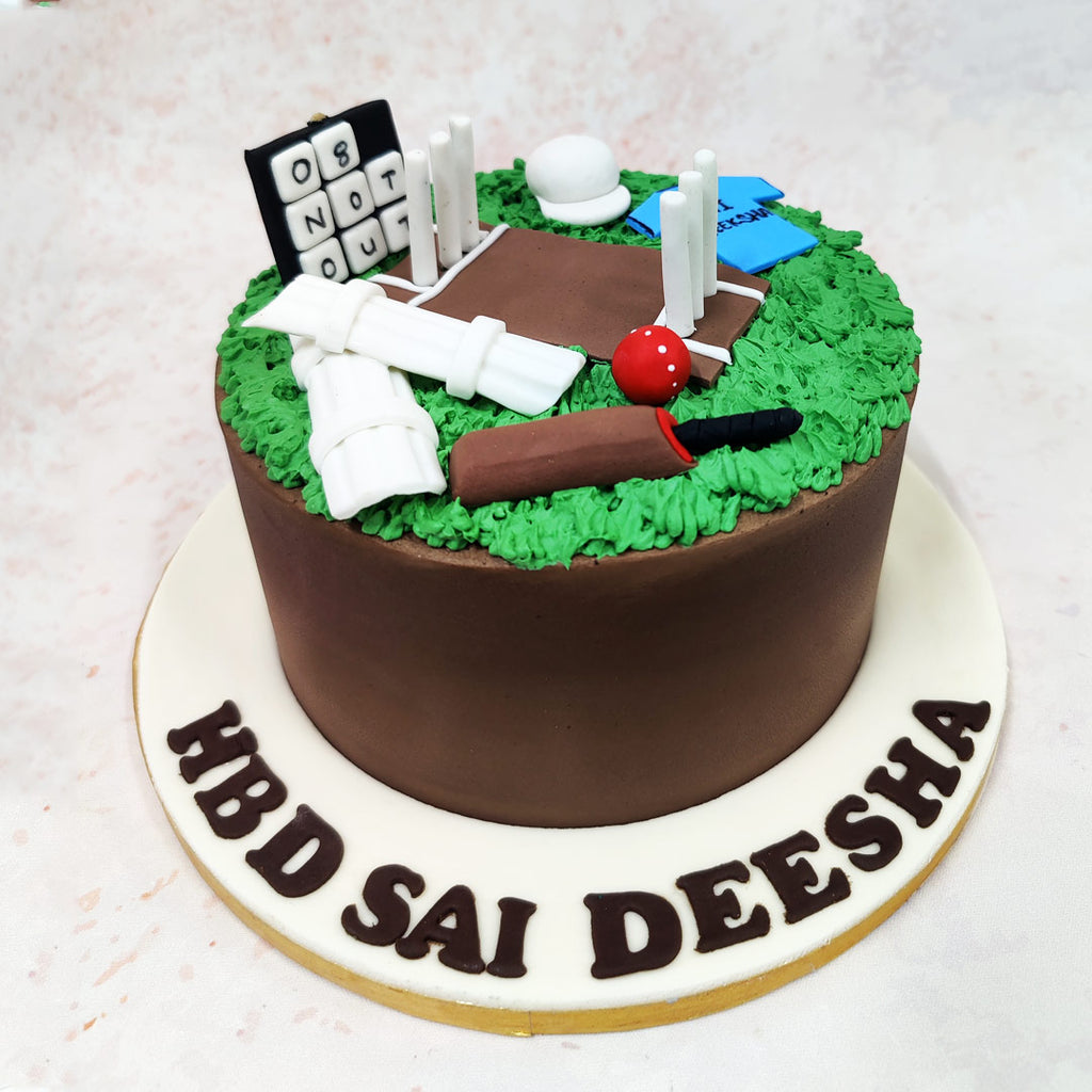 The rich chocolate exterior of this Birthday Cake For Him provides the perfect backdrop for a vibrant green pitch that instantly transports you to match day. 
