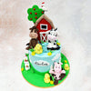 The rustic Birthday Cake For Kids atmosphere is enhanced by the spotted cow, friendly horse, and cheerful duckling characters that gather around the carefully crafted barn. 