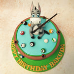 Featuring a whimsical donkey perched atop a billiard table, this Donkey Cake design is sure to bring a smile to everyone’s face. 