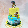 This Birthday Cake For Kids’ design features vibrant colours and intricate details, starting with the top tier in cheerful yellow and the bottom in sky blue.