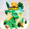 The adorable green dinosaur front and centre on this Birthday Cake For Kids—with its goofy grin, expressive eyes, and playful stance—bears more than a passing resemblance to Littlefoot’s cheerful companions from The Land Before Time, stirring up fond memories for parents and sparking curiosity in kids.