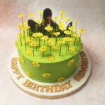 Perfect as a birthday cake for mom, the lush green fondant base instantly evokes a sense of freshness and vitality, setting the perfect backdrop for the array of delicate yellow flowers that seem to dance across the surface. 