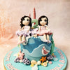 The use of pastel colours throughout, from the figurines' dresses to the sea creatures, enhances the Birthday Cake For Twins' whimsical appeal. 