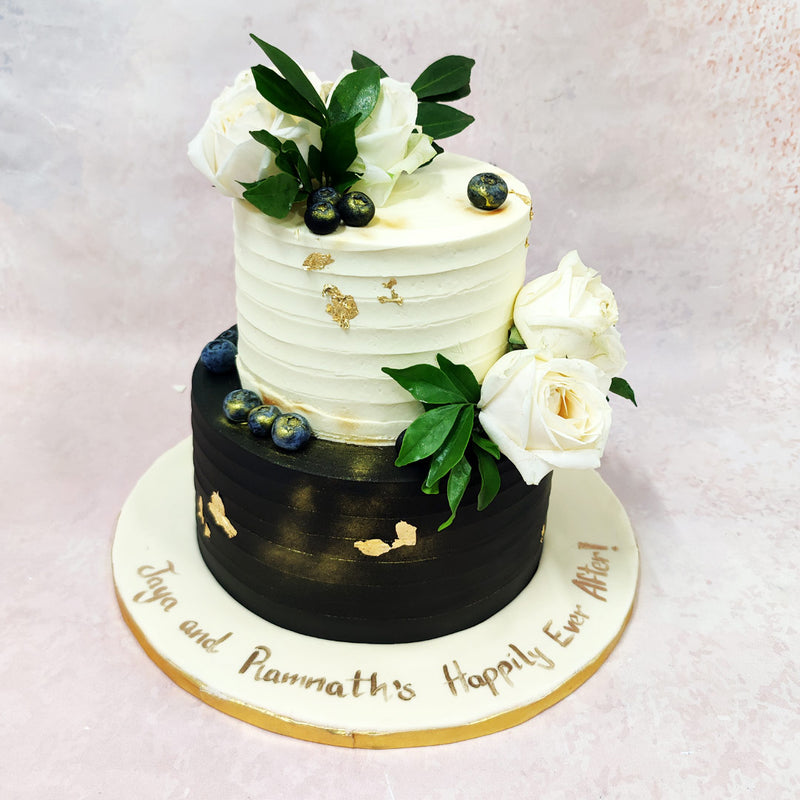 Fresh white roses and verdant green foliage crown the Birthday Cake For Wife, bringing natural elegance that symbolises purity and new beginnings—a tradition that dates back centuries in wedding celebrations.