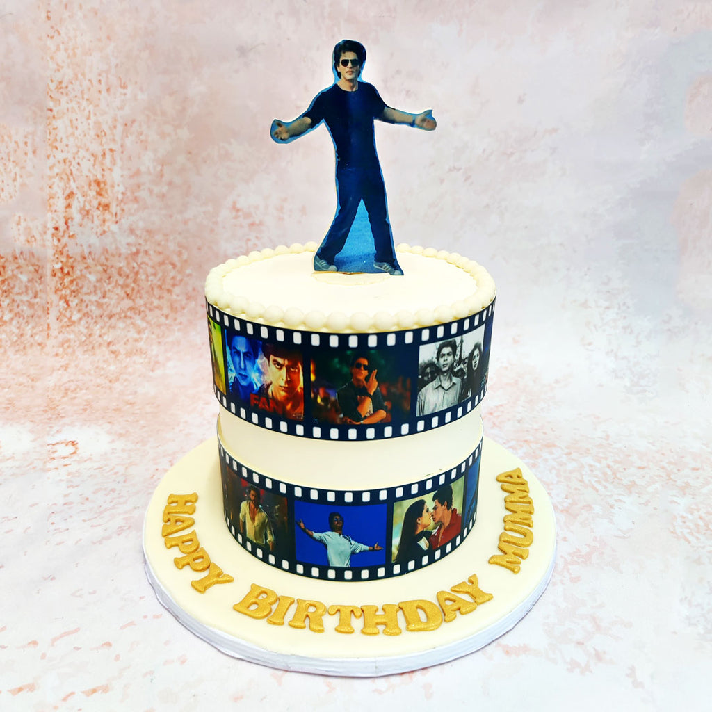 Each frame on the reel captures a different iconic moment, creating a nostalgic journey through his legendary filmography on this Birthday Cake For Wives.