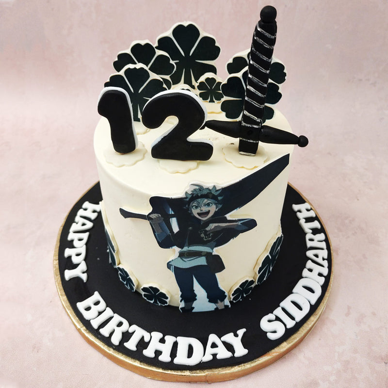 But that’s not all – at the centre of this Asta cake, you’ll find a stunning edible image of Asta himself, ready to leap into action with his iconic anti-magic sword by his side.