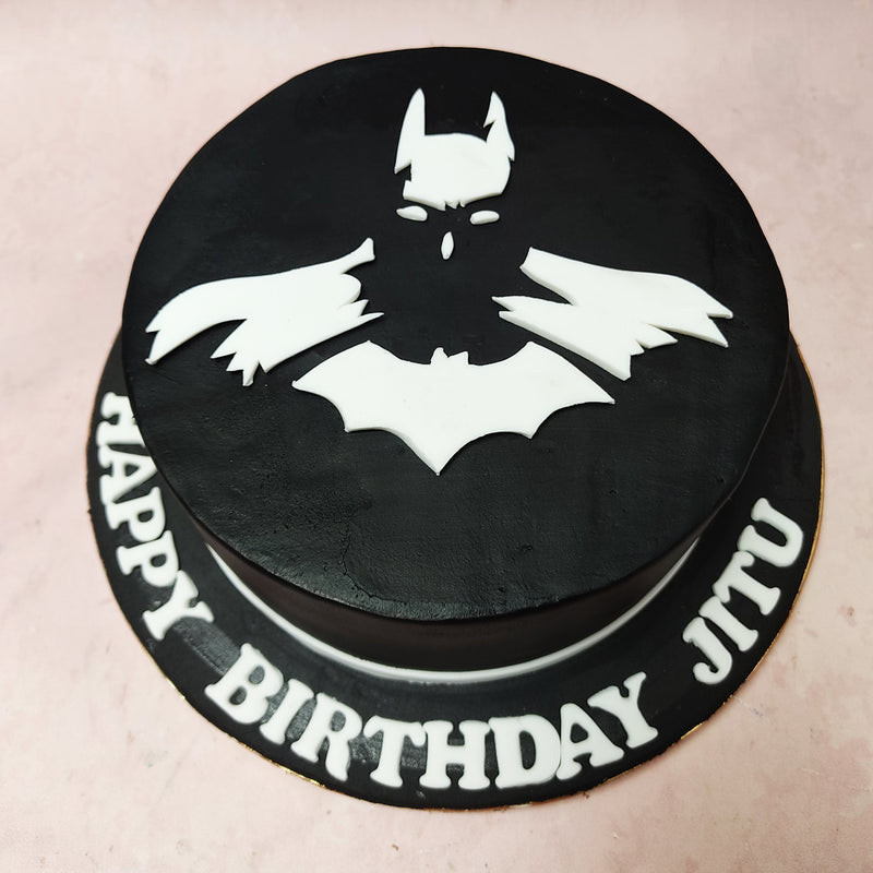 The Dark Knight Cake design becomes a symbol of justice, paying homage to iconic imagery from the series with its minimalistic design.