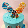 Giant lollipops and two of your little one's favourite characters this Bluey cake is a dream come truey cake! A Bluey and Bingo cake modelled after the ultimate duo!