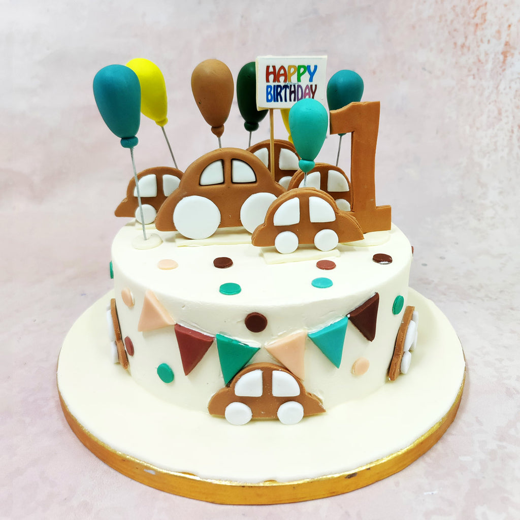 This Brown Toy Car Cake is the ultimate pit stop for a tiny speedster’s big day, bringing together classic charm and first-birthday excitement in one playful design. 