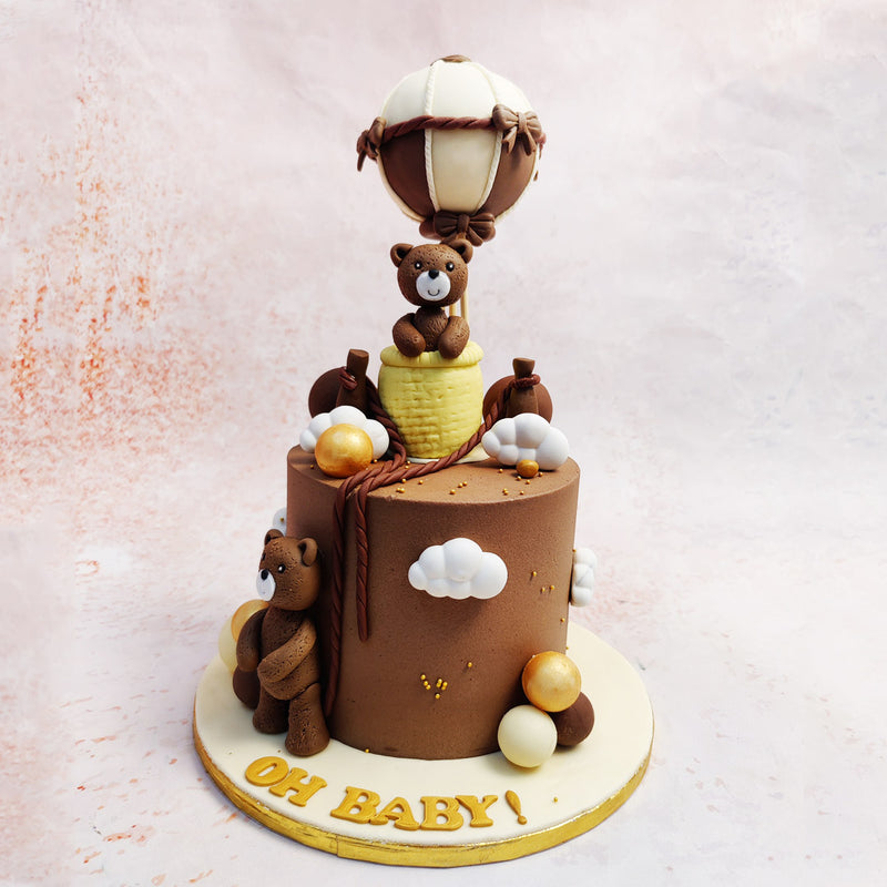 This Brown Teddy Bear Cake captures the whimsical charm of childhood adventure, featuring an enchanting hot air balloon theme with adorable teddy bears as its stars. 