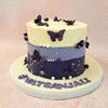  And finally, as she reaches the bottom layer of this 3 layer butterfly cake, adorned in a deep navy purple, she will be reminded of the depth of your love and the profound connection you share. Butterflies, known for their graceful flight and vibrant colours, are scattered throughout this three layer cake.