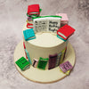 Perfect for bookworms, the crowning glory of this birthday cake for him / birthday cake for her is a collection of miniature books, each one meticulously rendered in sugary detail. 