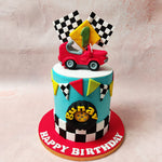 Picture this: a tiny red car, poised right on top of this Car Racing Cake in the middle of two chequered flags, ready to zoom into the excitement. 