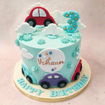 Spot vintage vehicles all over driving through the clouds, making this design a flying cars cake. 