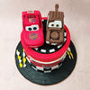 At the centre of this Lightning McQueen cake sits the iconic Cars movie logo, proudly displayed in all its glory. 