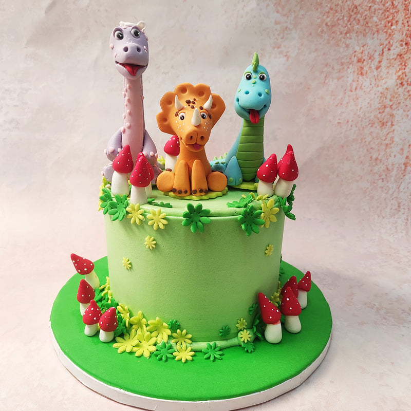 Perched atop this Cartoon Theme Cake are the iconic trio of Littlefoot, Cera, and Ducky, their playful expressions capturing the spirit of adventure and camaraderie that defines The Land Before Time. 