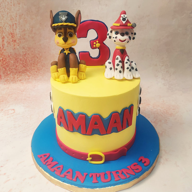 Standing proud atop this vibrant Chase Paw Patrol Cake, Chase and Marshall, the beloved characters from Paw Patrol, sit ready for action. 