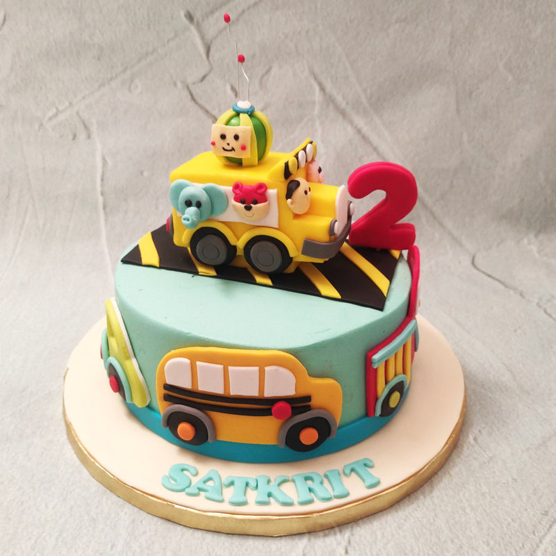 Indulge in the whimsical world of Cocomelon with our enchanting Cocomelon Wheels On The Bus cake. 