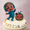 Next to the Cocomelon JJ cake topper are buttercream peaks, meticulously crafted to resemble the iconic logo of Cocomelon, featuring baby JJ and the adorable watermelon logo. 