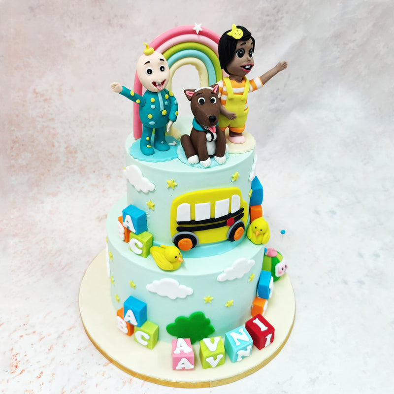 This show stopping Cocomelon Party Cake brings the 'melon-choly' mood-lifting world of CoComelon to life (see what we did there?), where JJ and his partner in rhyme, TomTom, are having a whale of a time atop their sugary stage. 