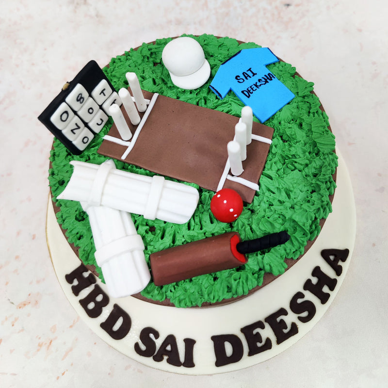 A cricket ball and bat rest nearby, with each stitch and grain texture remarkably recreated on this Cricket Bat and Ball Cake. 