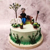 The buttercream grass, plants, and flowers on this garden cake represent the beauty and abundance that fathers bring into their families' lives.