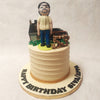 A figurine of dad, home and car rests on top of this father theme cake making this design perfect as a birthday cake for dad by showcasing everything that's close to his heart.