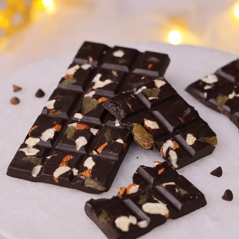 Dark Diwali chocolate bar topped with almonds, cashew and rasins