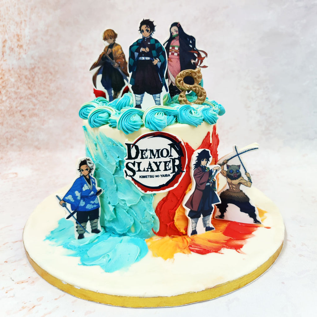 This Demon Slayer Theme Caked showcases a masterful blend of turquoise and fiery orange buttercream, representing the iconic elemental powers featured in the series.