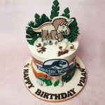 Amidst the sweet wilderness on this Dinosaur Jungle Cake, encounter cartoonish figurines of the legendary T-Rex and the mighty Triceratops, vividly brought to life from the movie.