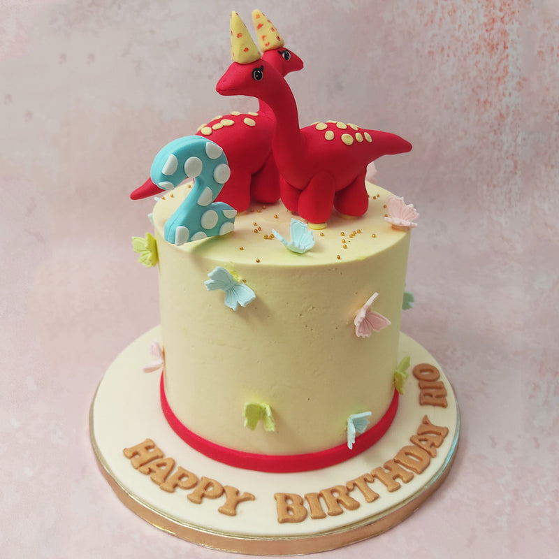 Embellished with pastel coloured butterflies all over, this Dinosaur and butterfly cake will transport your little one to a naturesque world that existed millions of years before our time.