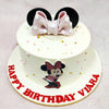 The highlight of this Disney Minnie Cake is the oversized pink fondant bow with white polka dots, nestled between glossy black Minnie ears—an iconic silhouette that needs no introduction. Lightly scattered around the soft vanilla base are golden and blush sugar pearls, adding just the right amount of sparkle.