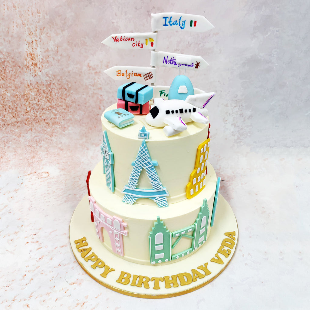 Perched atop this wanderlust-inspired Flight Theme Cake sits an adorable fondant airplane, complete with delicate details like windows and wings, ready to whisk adventurers away to their next destination. 