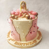 To further enhance the magical ambiance, this fairy cake is embellished with edible pink butterfly decorations. 